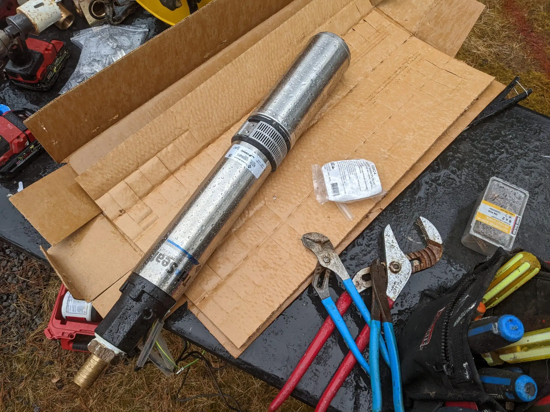 Submersible well pump during installation.