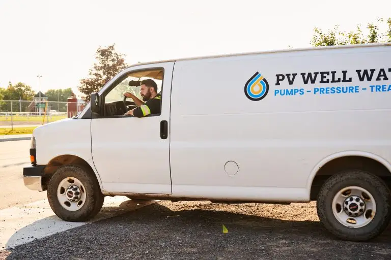 PV Well Water van driving in Ottawa, Ontario