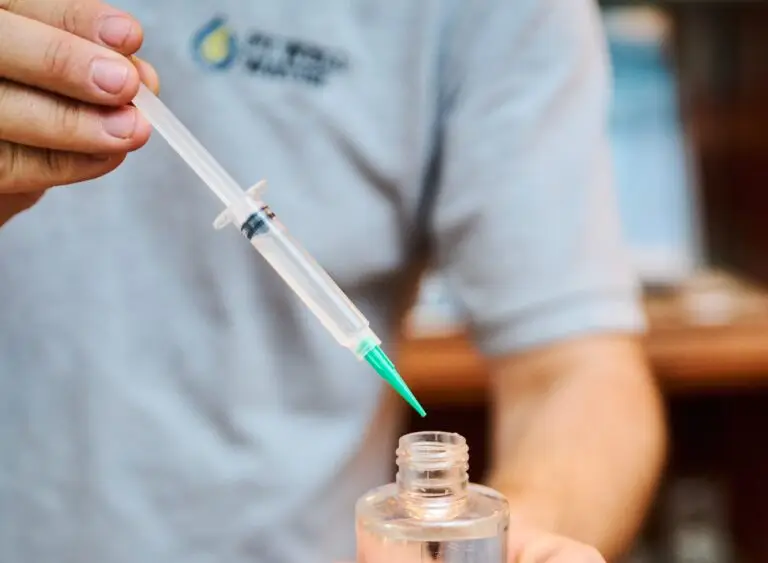 A PV Well water expert completes a free in home well water quality test.